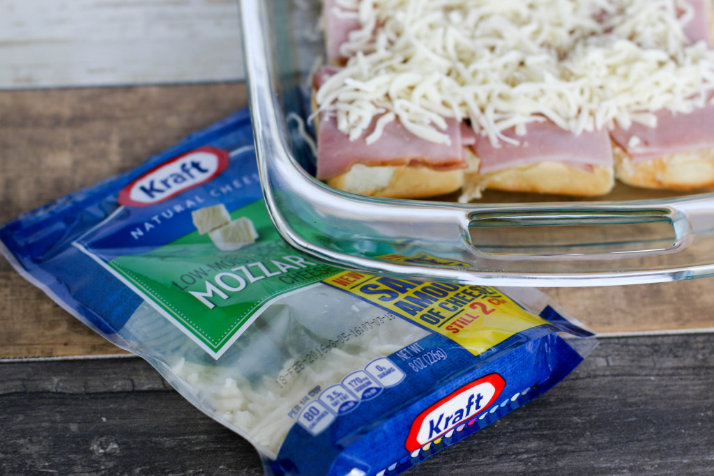 ham and cheese sliders in a glass casserole dish