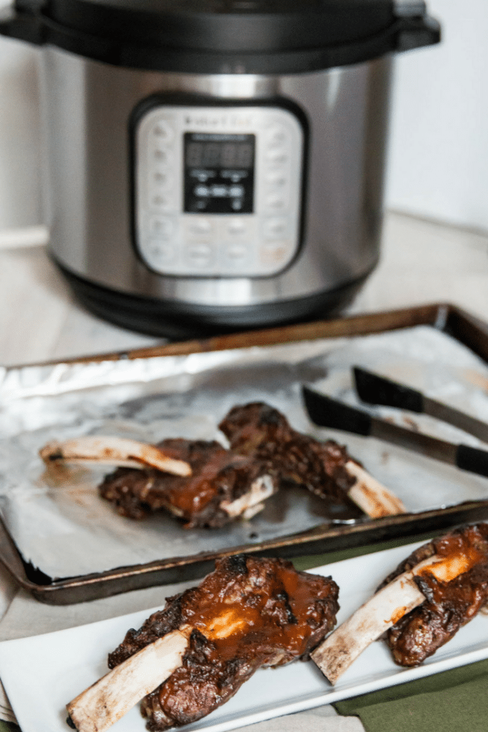 You're gonna love this easy peazy, mouth-watering Instant Pot Ribs Recipe! These beef ribs are made in minutes not hours with the help from your pressure cooker! Great Low-Carb and Gluten-Free recipe!