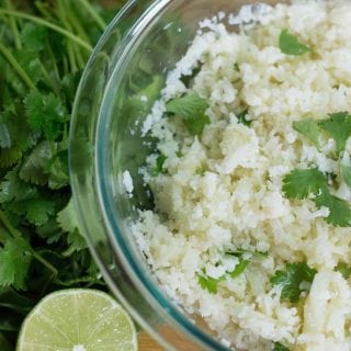 cilantro lime cauliflower rice in a clear bowl