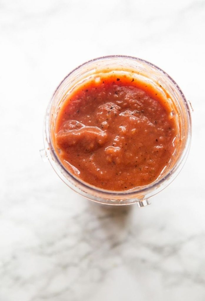 red sauce in a clear cup