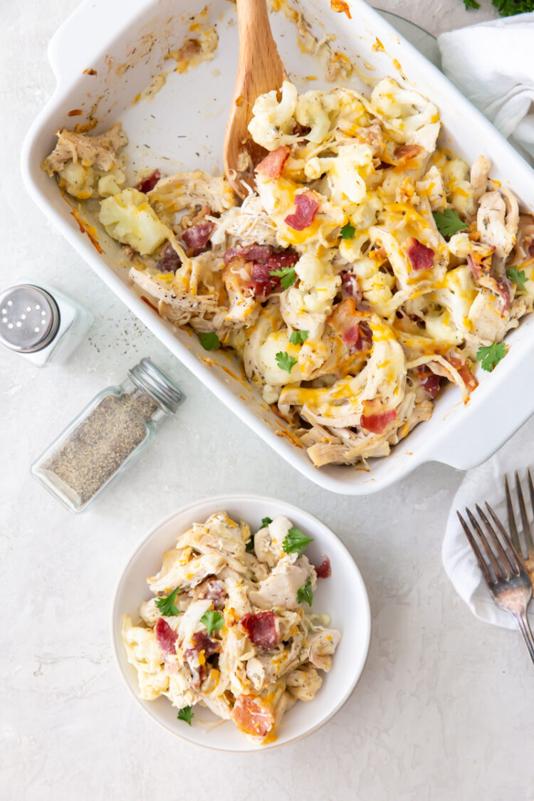 keto chicken bacon ranch casserole in a serving bowl and saucepan