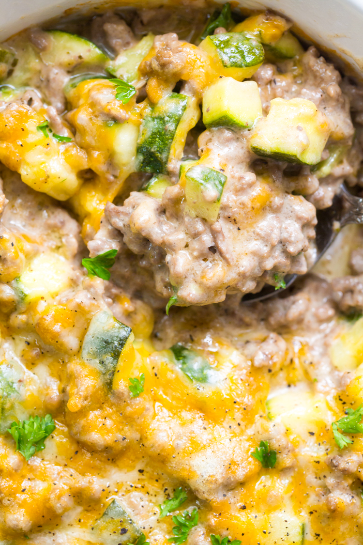 close up image of keto ground beef in a white casserole dish 