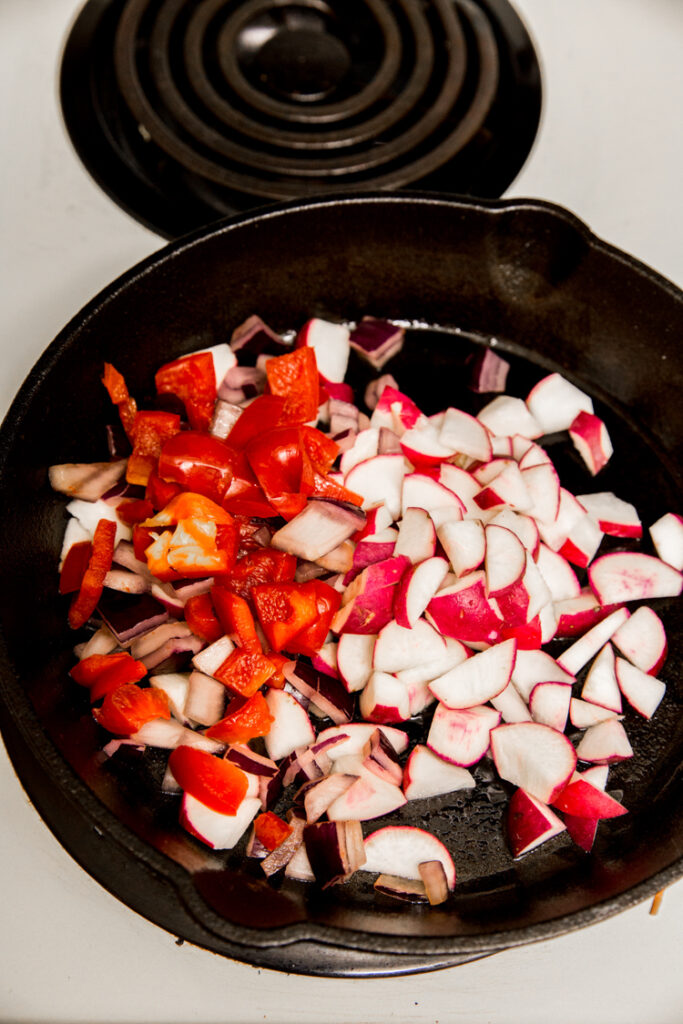 Cooking onions and peppers in Cast Iron Skillet