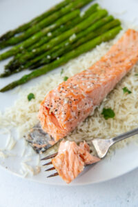 baked salmon with a fork bite taken out