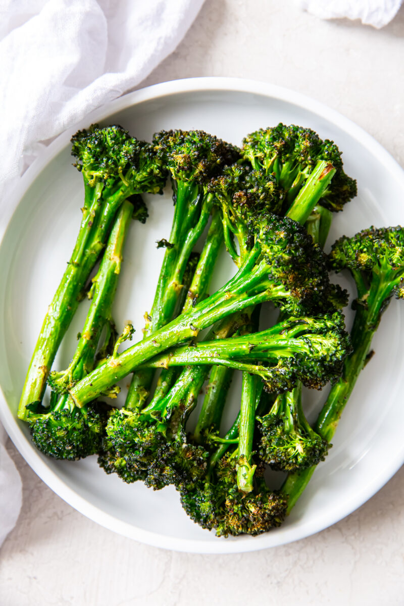 Air Fryer Broccolini on a white plate.