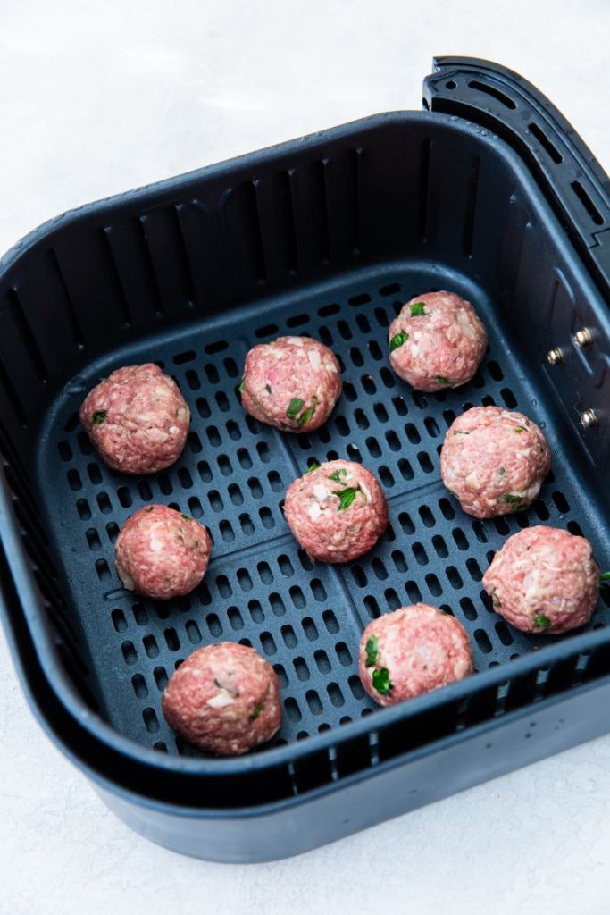 keto meat balls in an air fryer basket