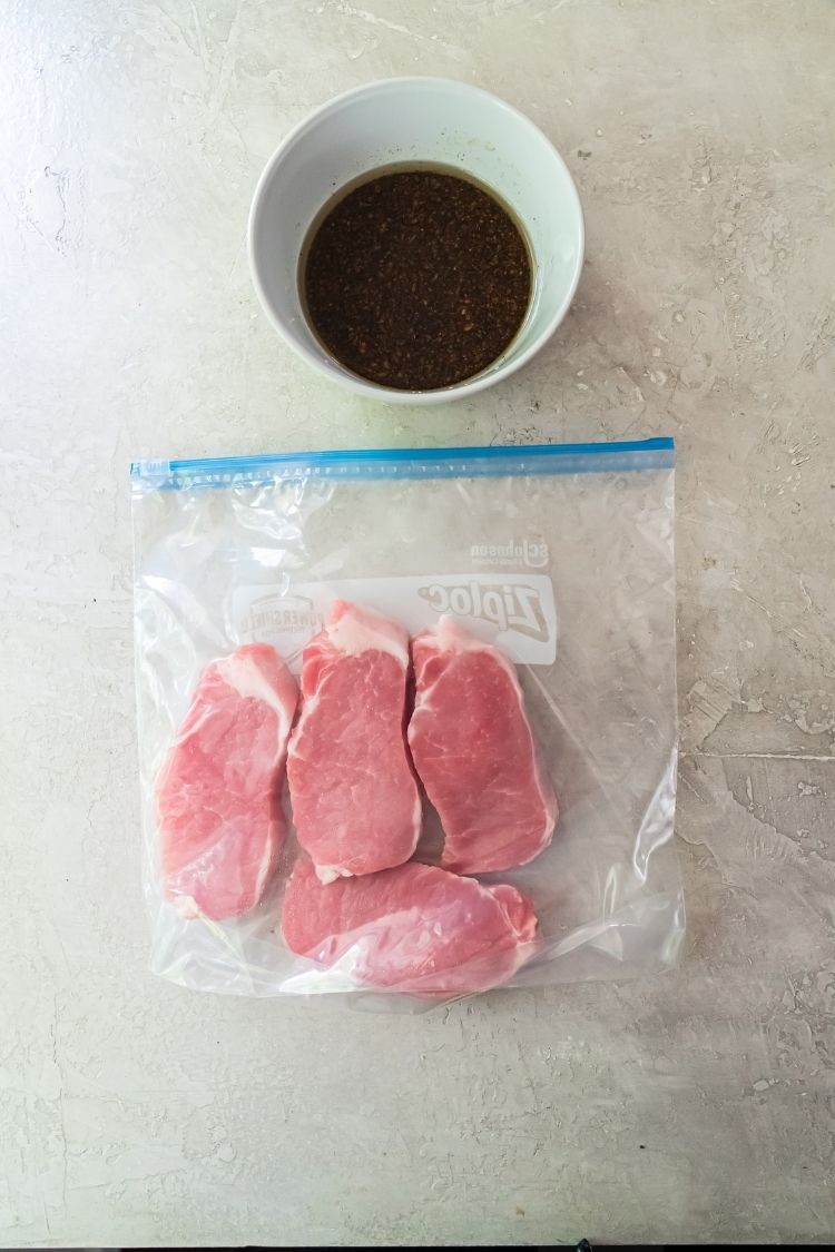 pork chops in a bag and marinade in a separate bowl
