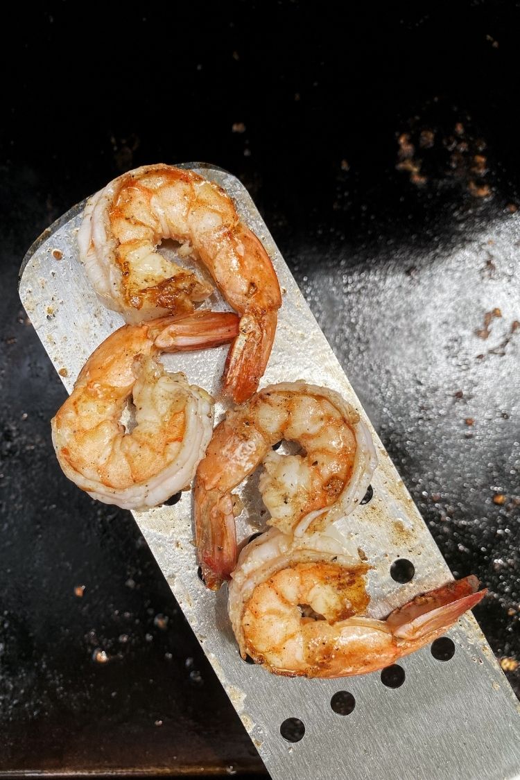cooked shrimp on a spatula