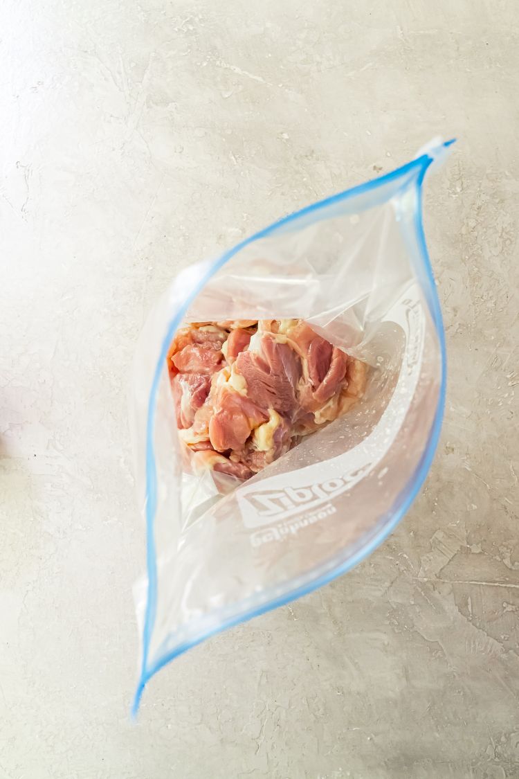 boneless skinless chicken thighs in a gallon baggie