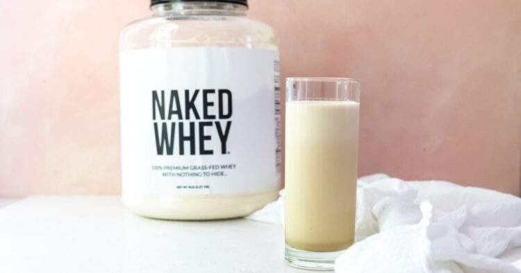 Java protein shake with naked nutrition protein powder in the background