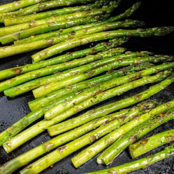 asparagus being cooked on The Blackstone Griddle