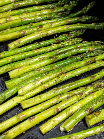 asparagus being cooked on The Blackstone Griddle
