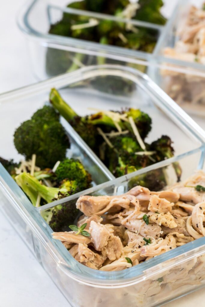 meal prep with shredded chicken thighs and broccoli