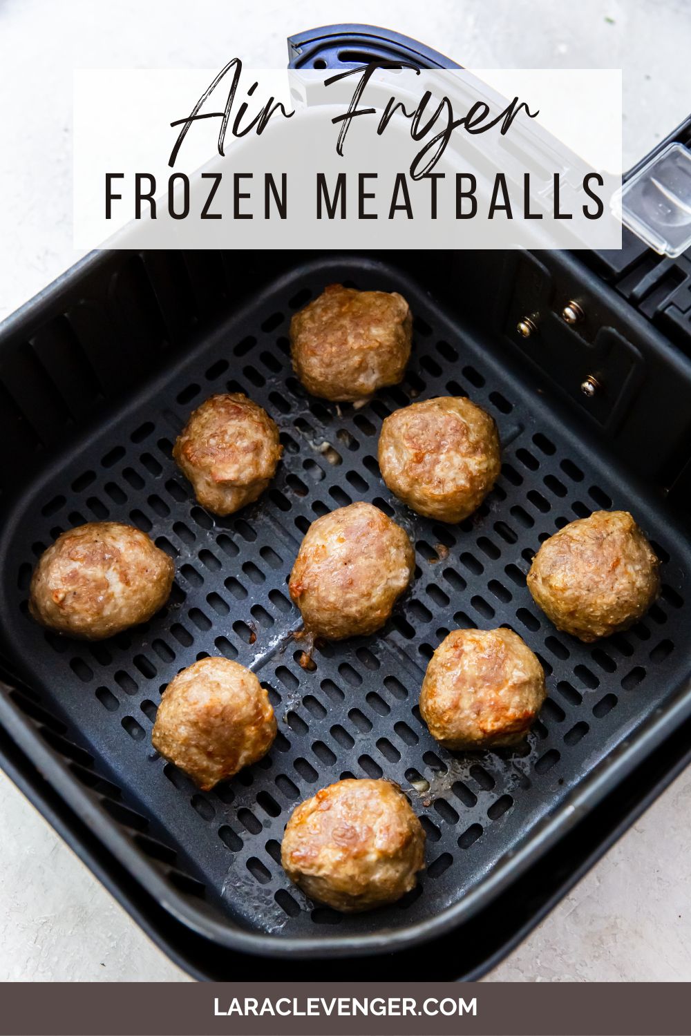 pin of frozen turkey meatballs in the air fryer basket