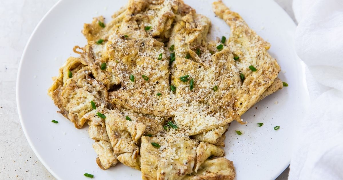 blackstone scrambled eggs on a white plate