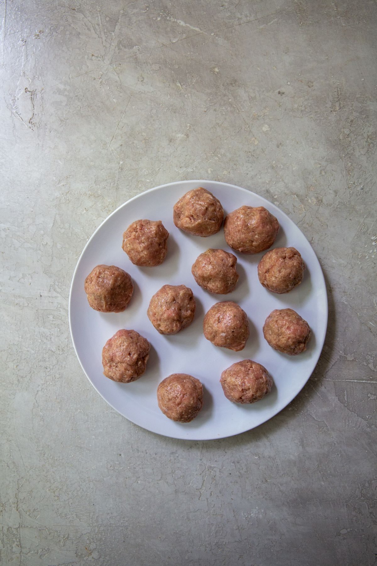 cooked meatballs on a white plate