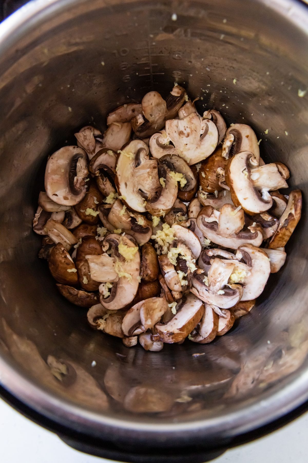 raw mushrooms inside the instant pot