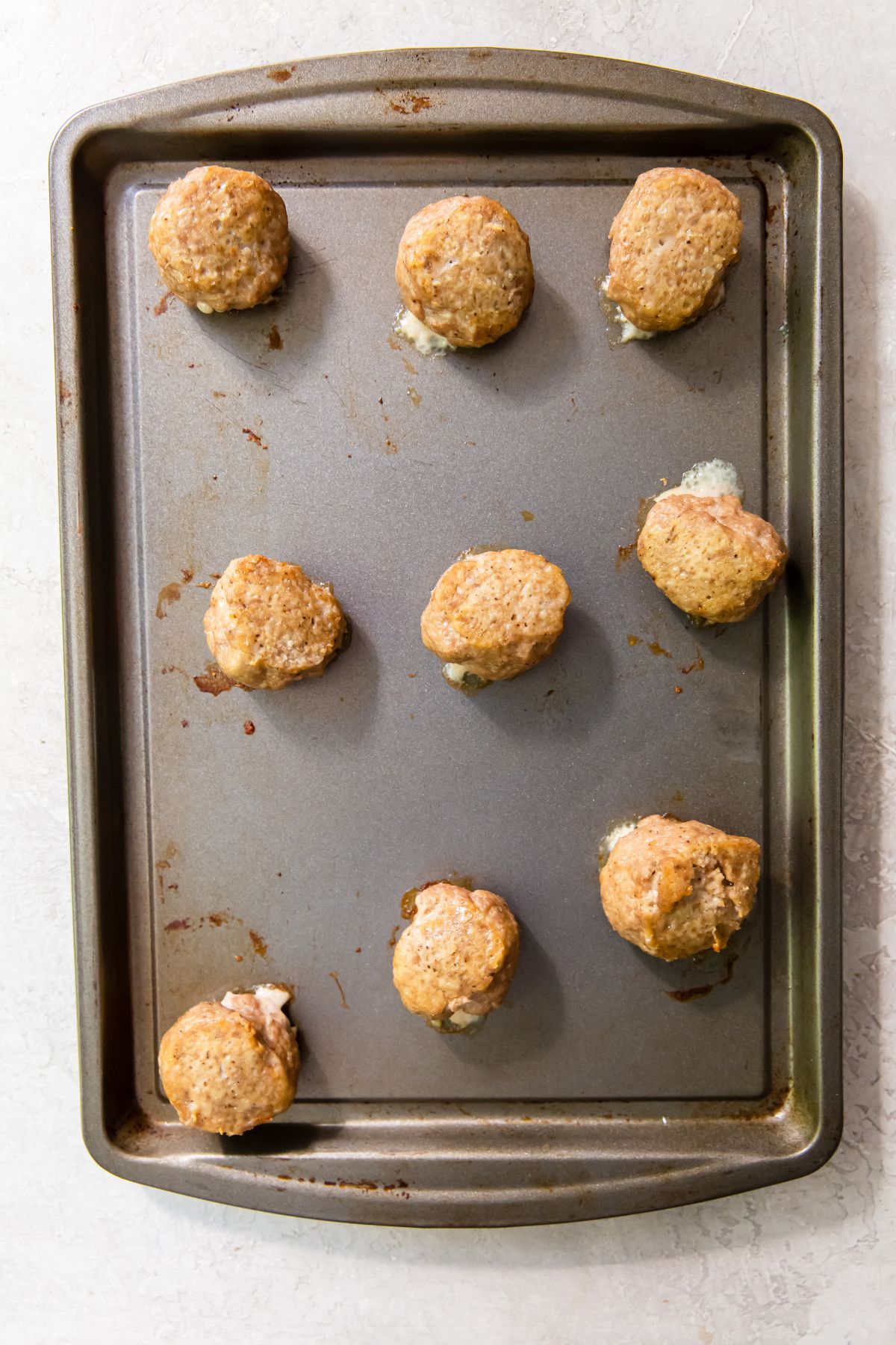 cooked oven meatball on a sheet pan