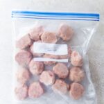 raw frozen meatballs in a large baggie