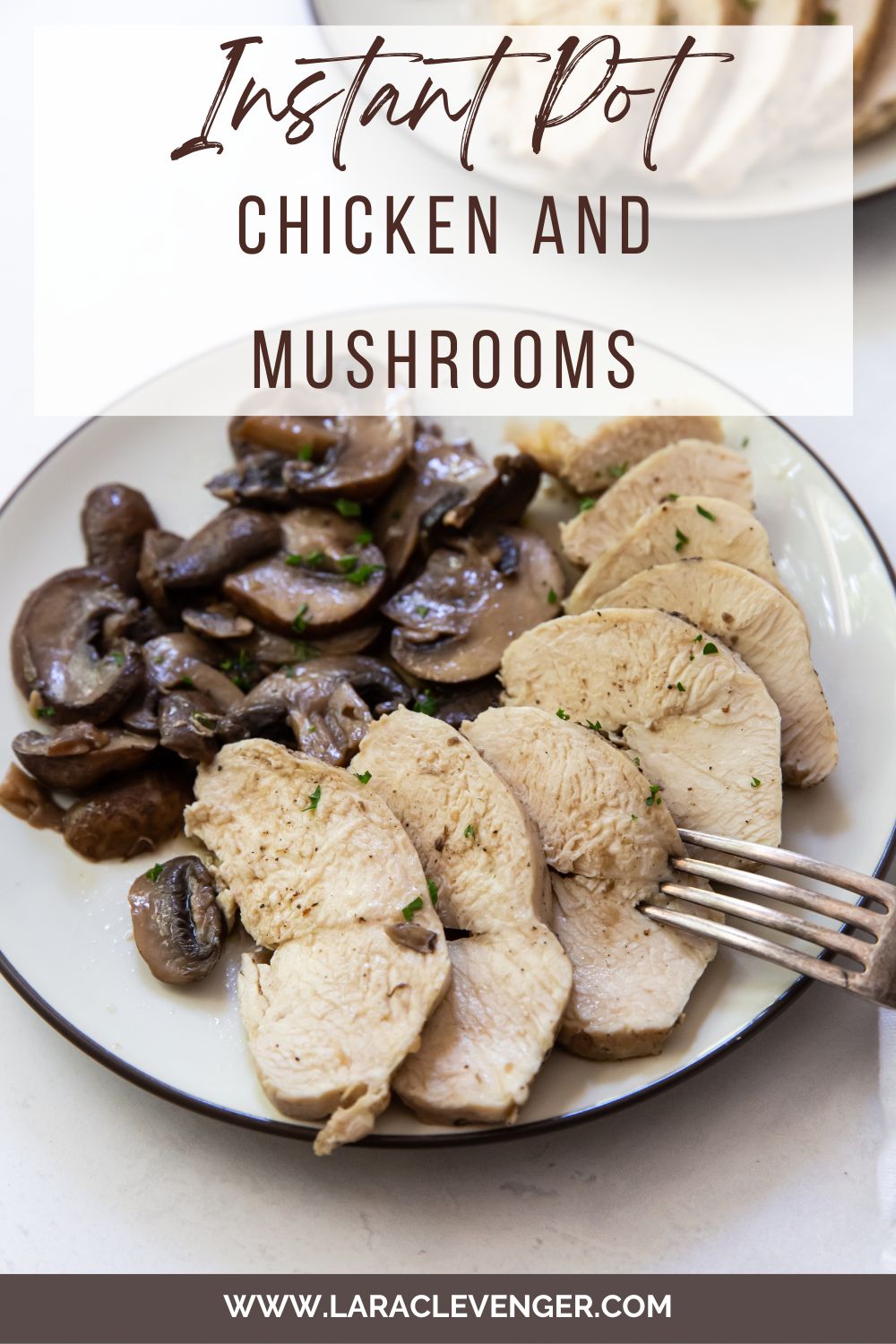 white plate with chicken and mushrooms on it.