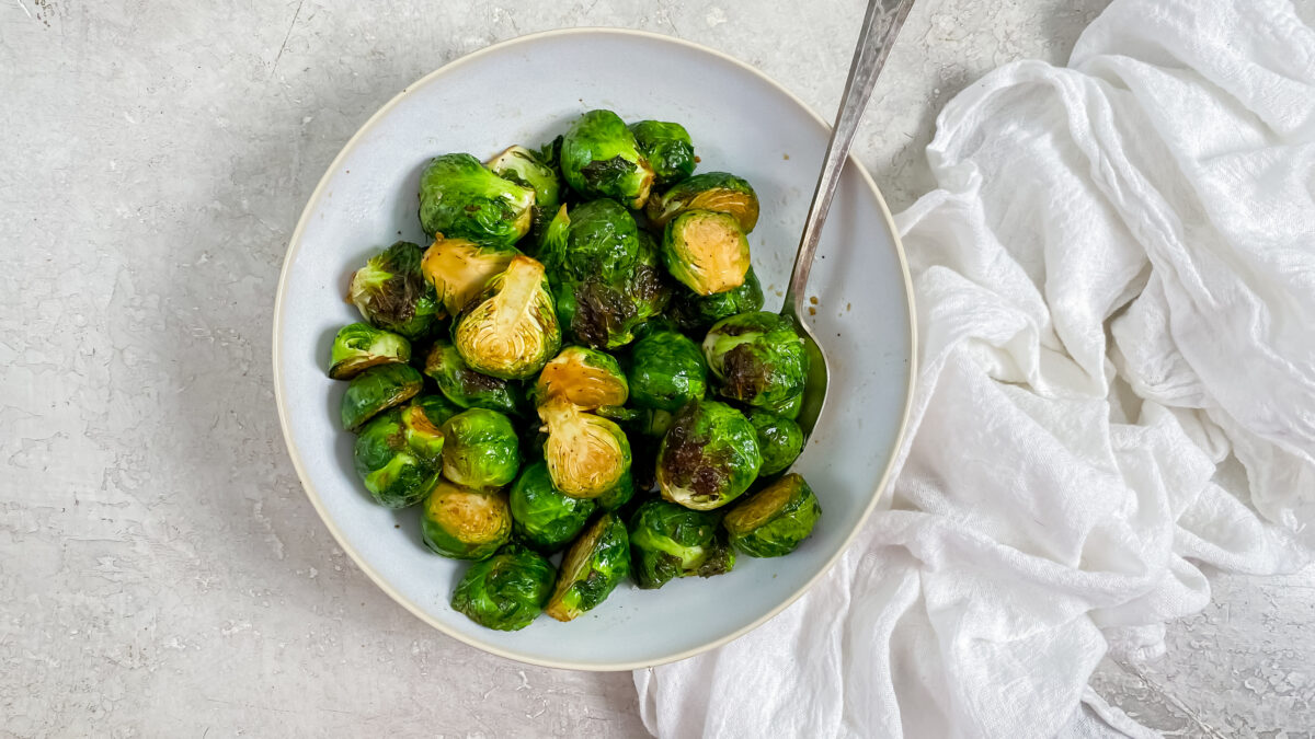 Air fried brussel sprouts in a white bowl