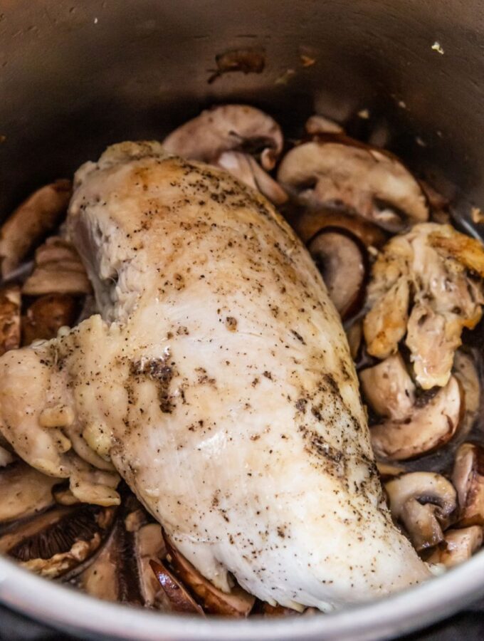 cooked chicken breast and mushrooms inside an instant pot