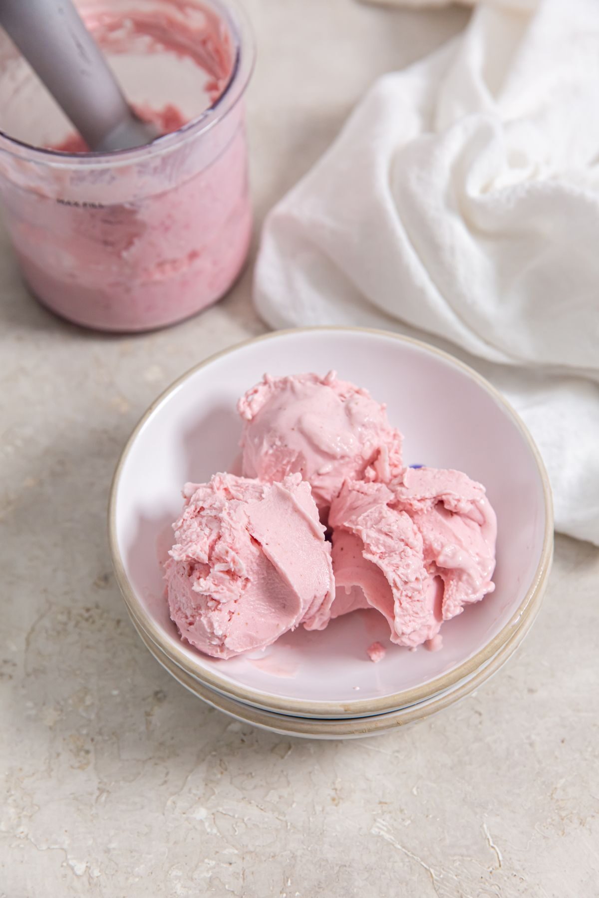 Ninja Creami Strawberry ice cream in a small white bowl