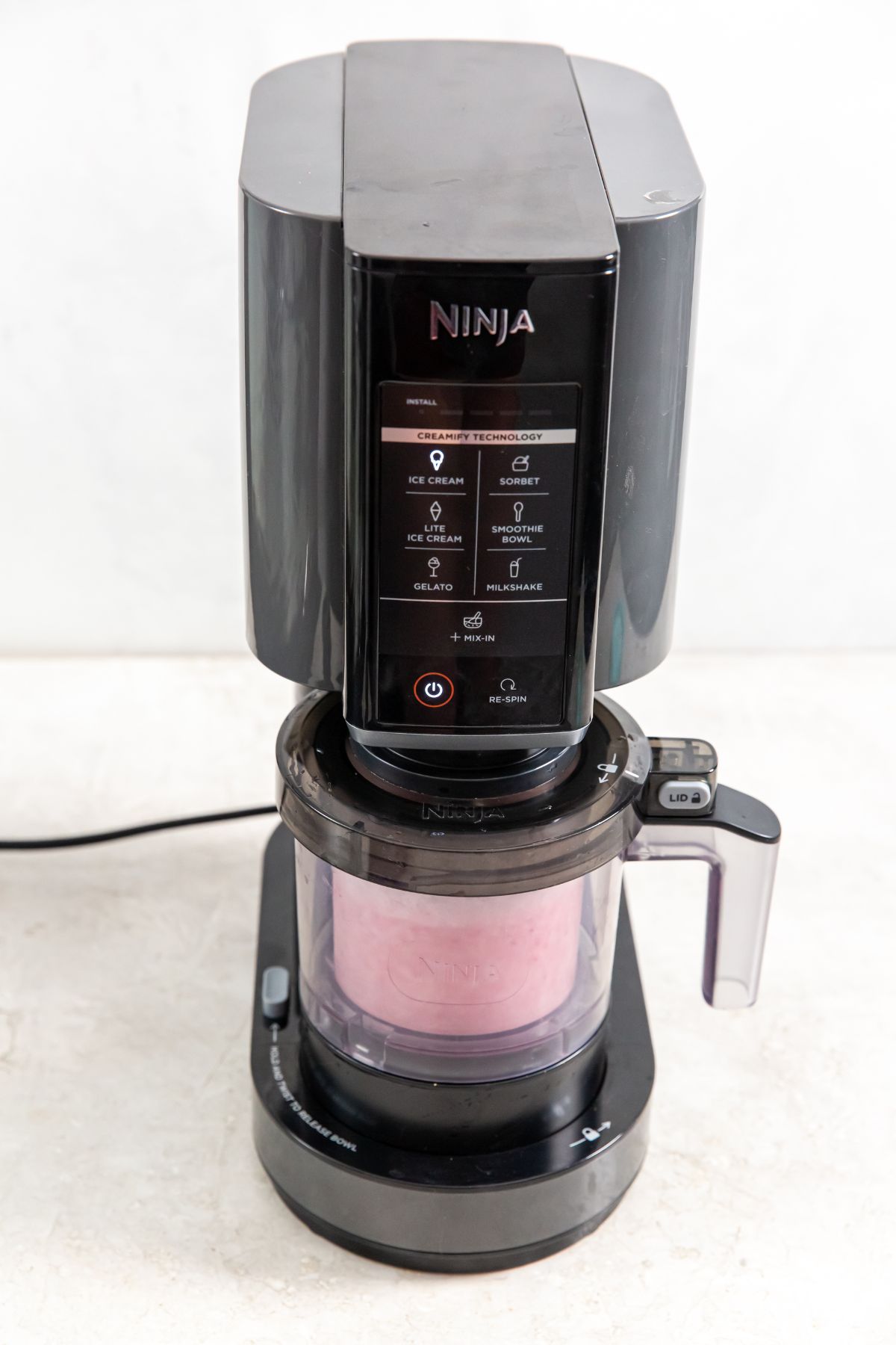 ice cream being blended in a ninja creami