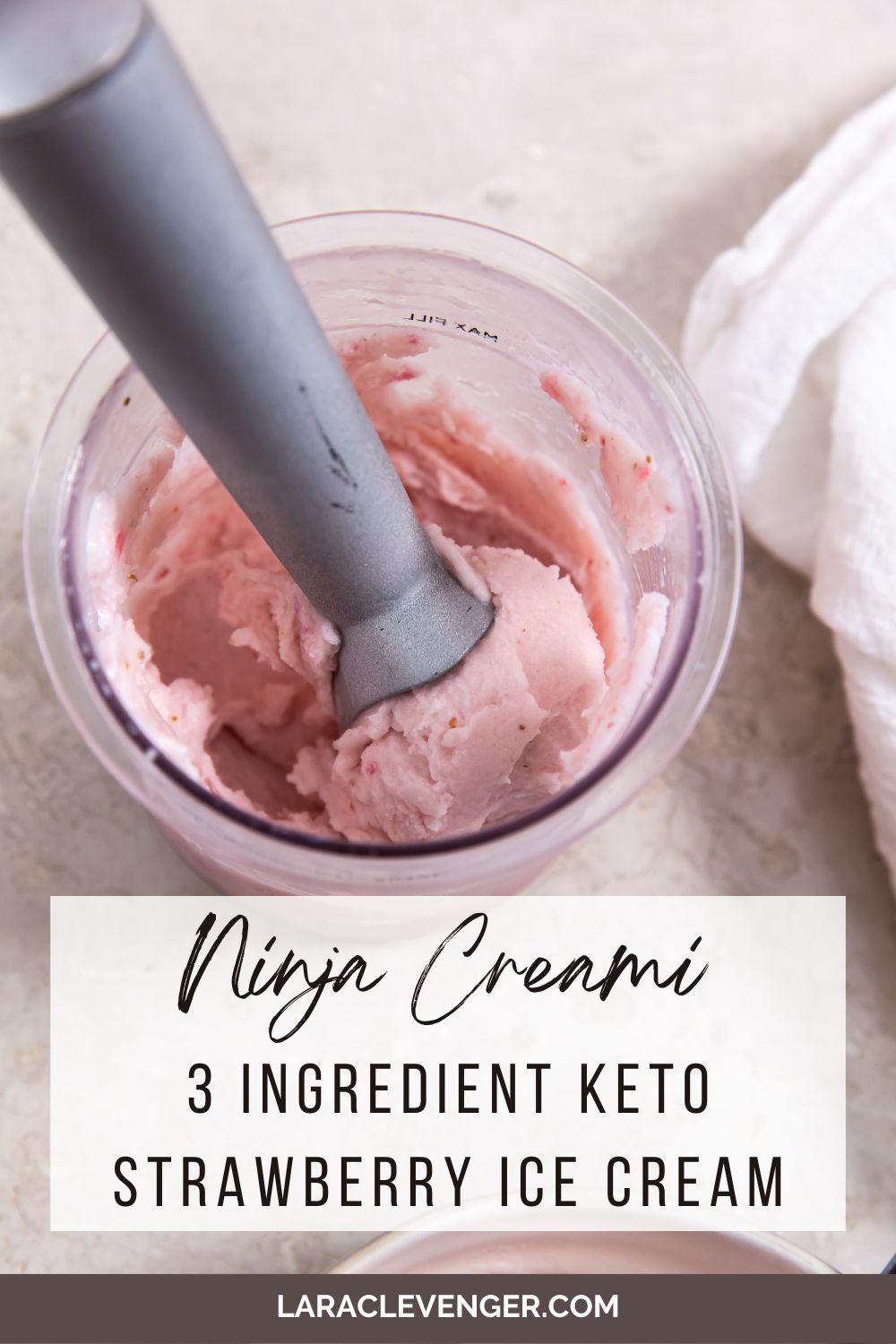 pinnable keto strawberry ice cream in a pint container with an ice cream scoop