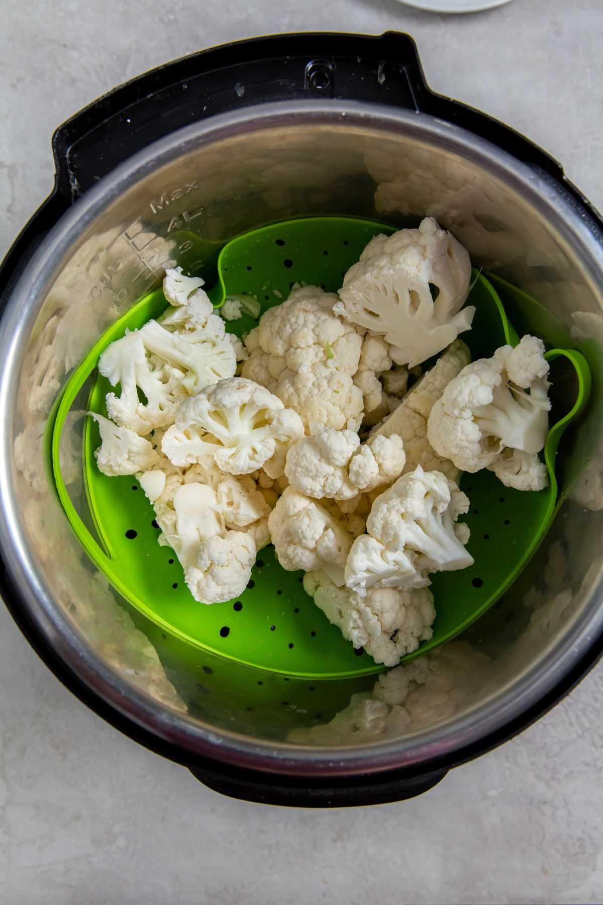 cauliflower in the instant pot with a trivet