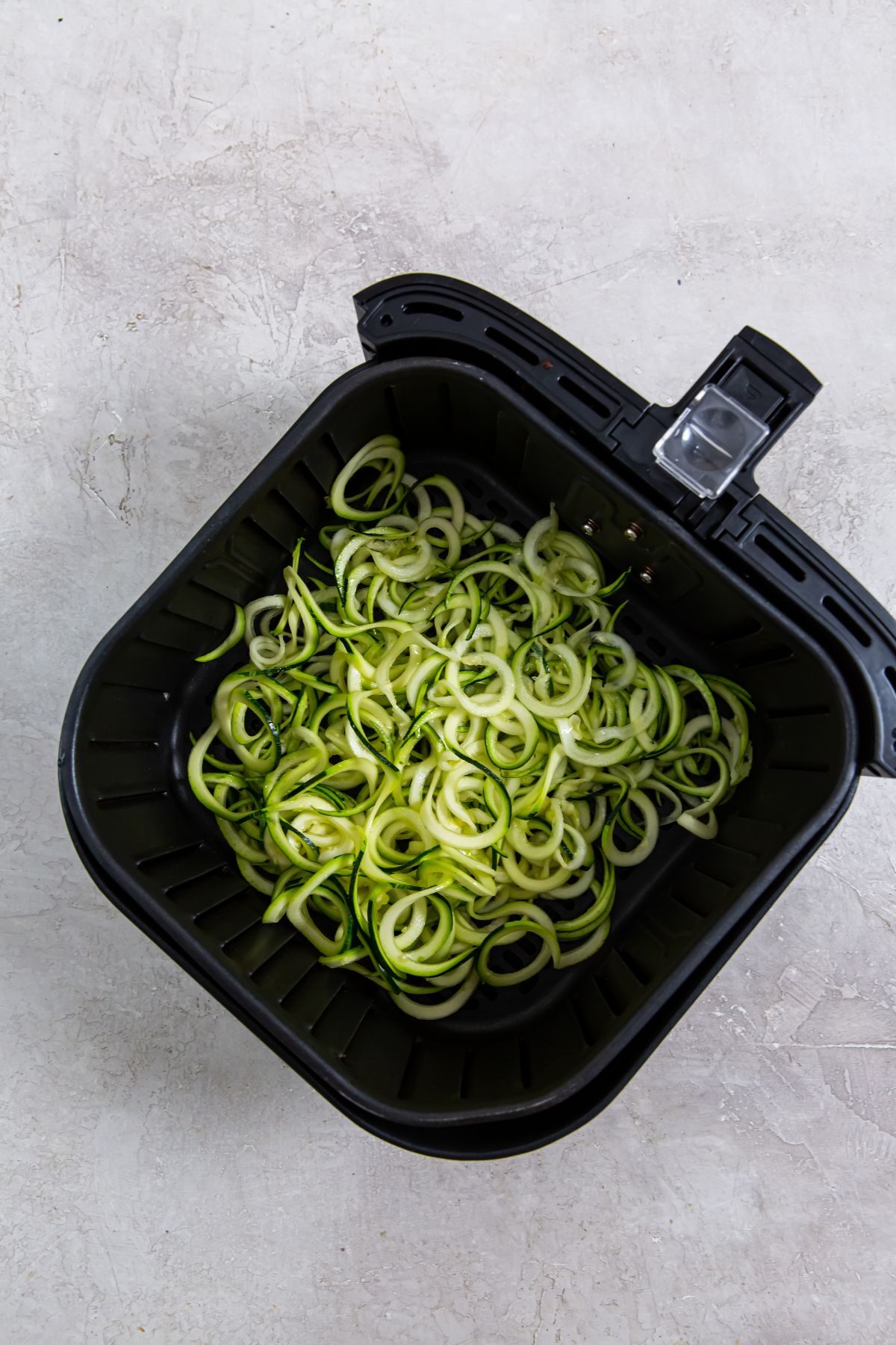 Zoodles in the air fryer basket