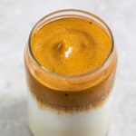 Protein Dalgona Coffee in a clear glass