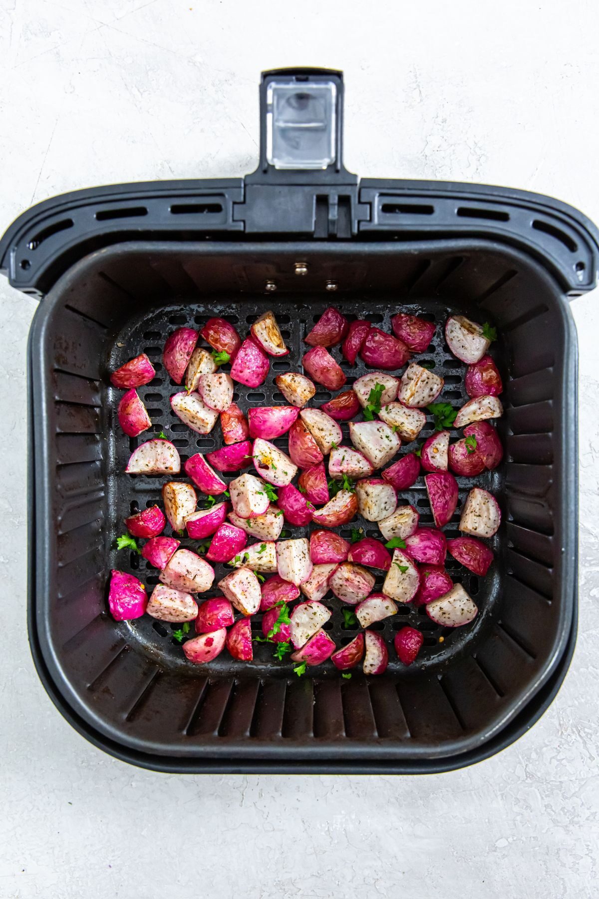 Air Fryer Radishes in the air fryer basket