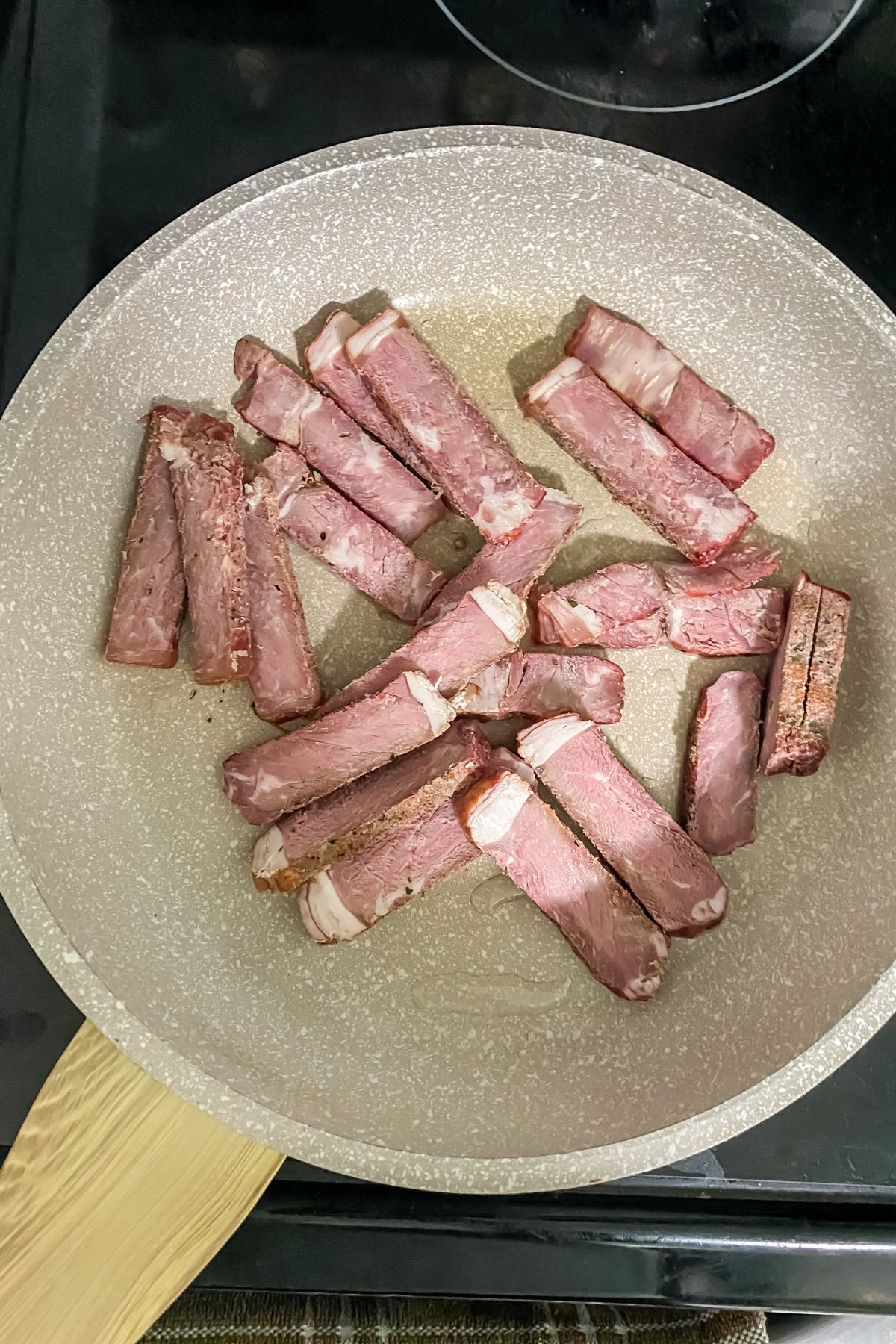 leftover steak in a skillet