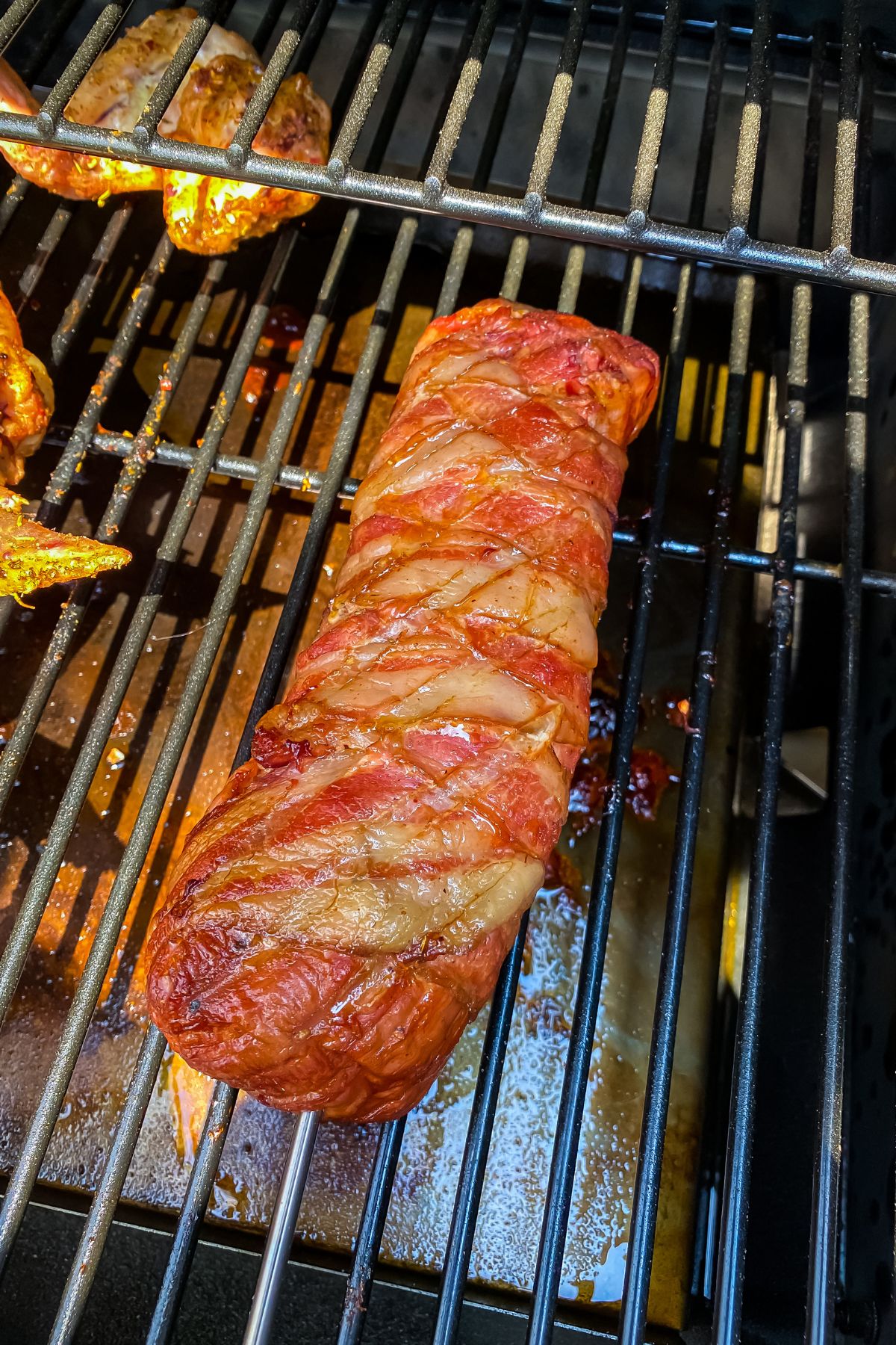 Smoked Bacon Wrapped Pork Tenderloin in the smoker