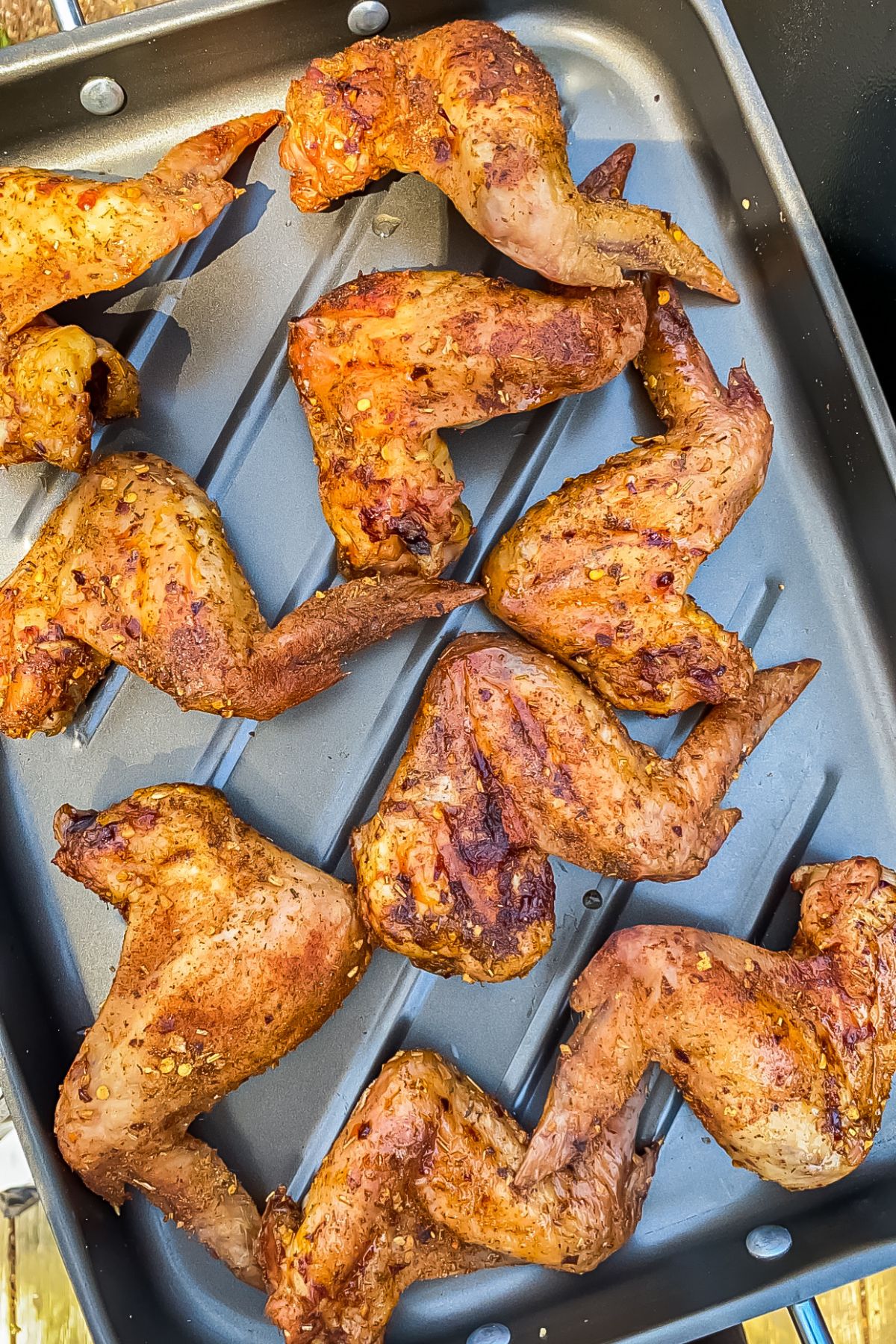 smoked chicken wings on a baking sheet