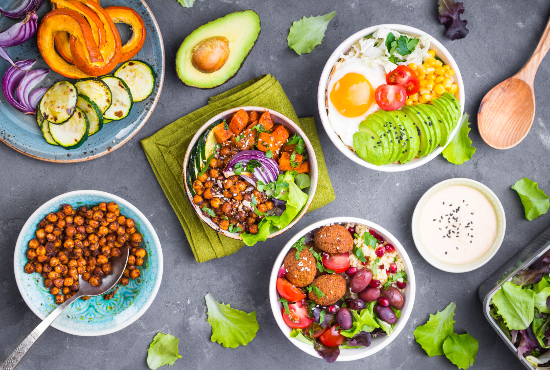 A variety of bowls filled with different types of food.