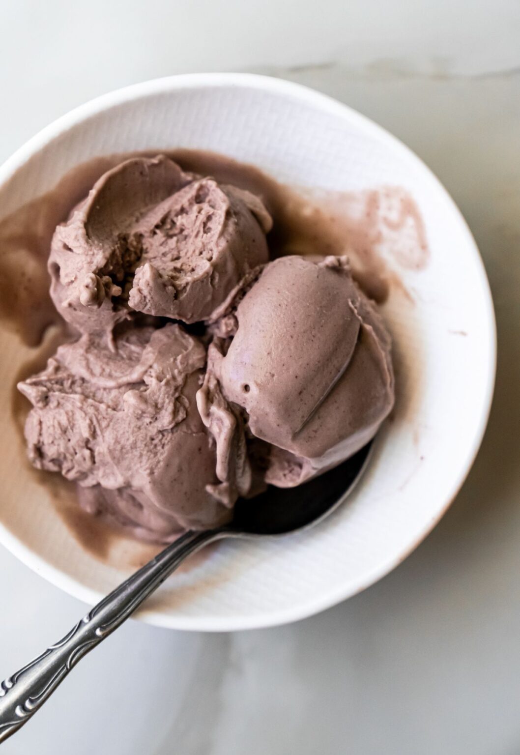 Ninja Creami acai ice cream with a spoon.