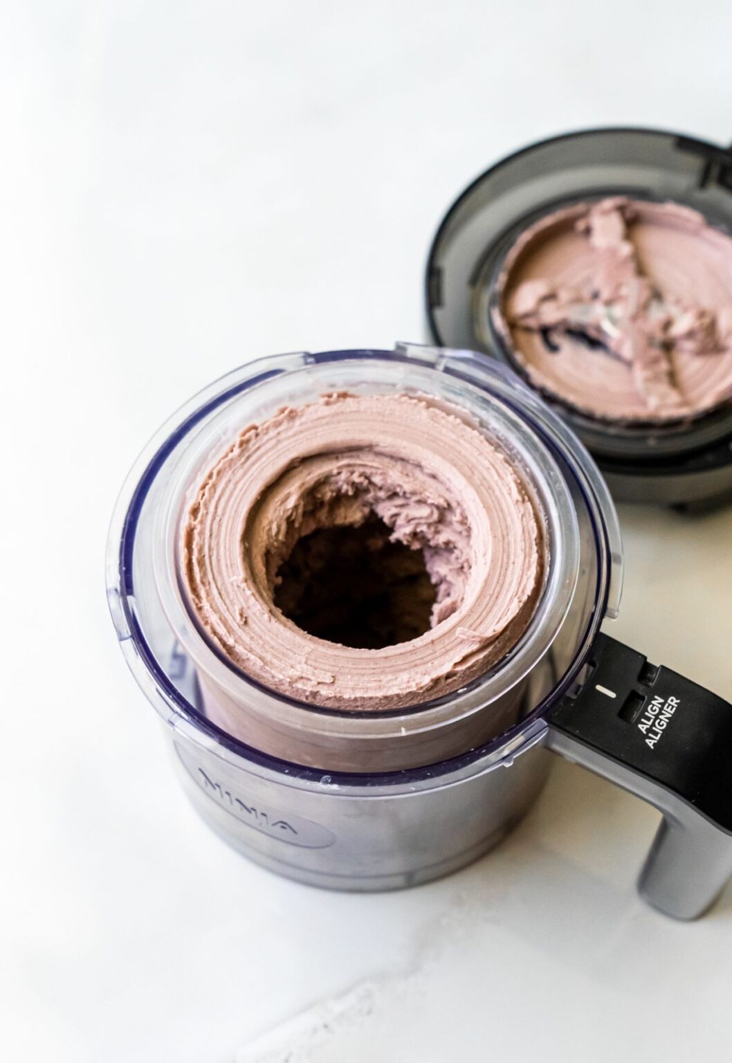 Acai ice cream in pint holder blended.