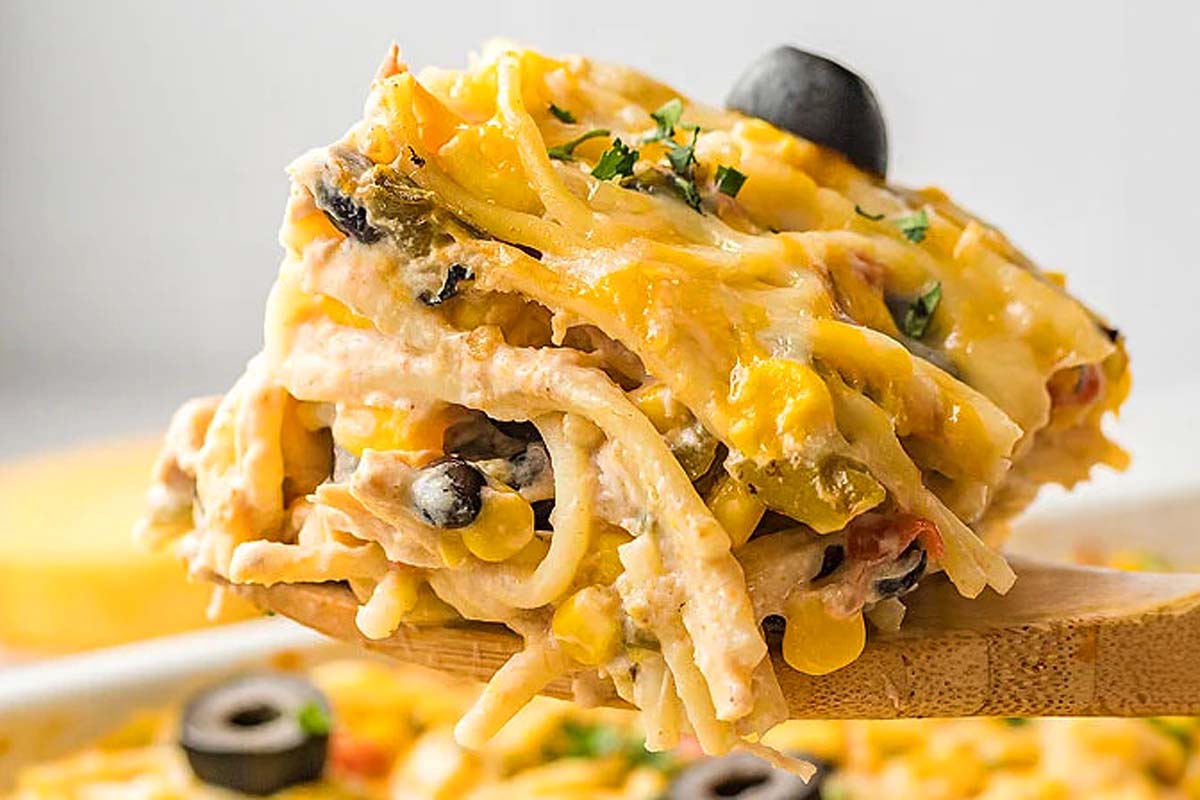 A large scoop of a spaghetti casserole.