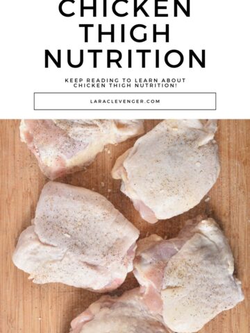 Raw chicken thighs on a wooden cutting board, sprinkled with seasoning. Text above reads "Chicken Thigh Nutrition.