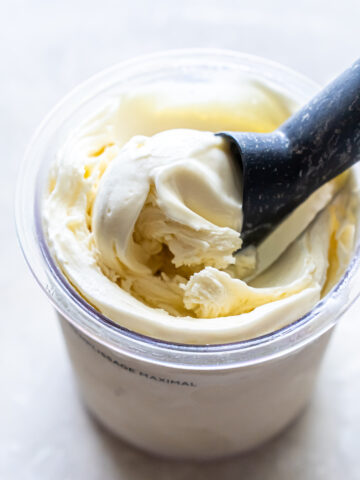 pineapple protein ice cream with an ice cream scoop.