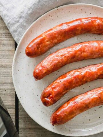 4 pcs of Air Fryer Sausage in a plate.