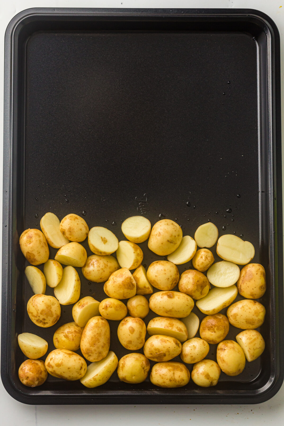 potatoes on a sheet pan.