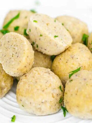 Almond Flour Dumplings shape like a ball and sprinkled with chopped basil leaves