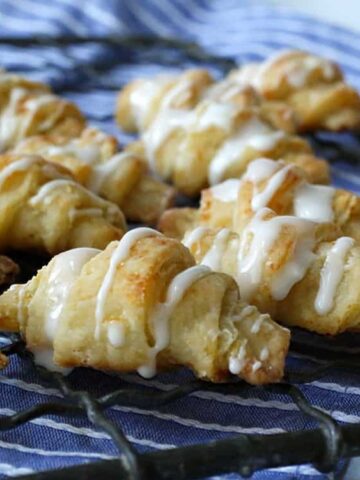 cheese crescent rolls on a rack cooler