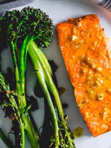 frozen salmon cooked in an air fryer with roasted broccoli and for on the side