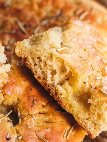 cut bread with rosemary on top