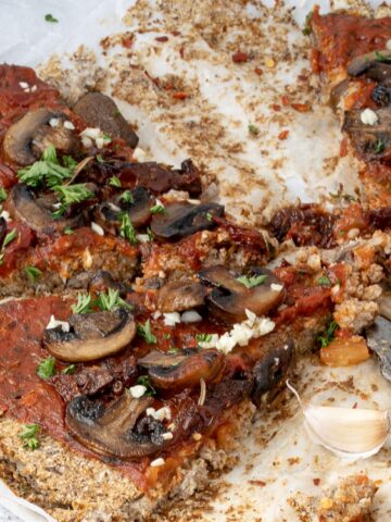 Vegan Cauliflower Pizza Crust with Garlicky Mushroom & Tomato Topping