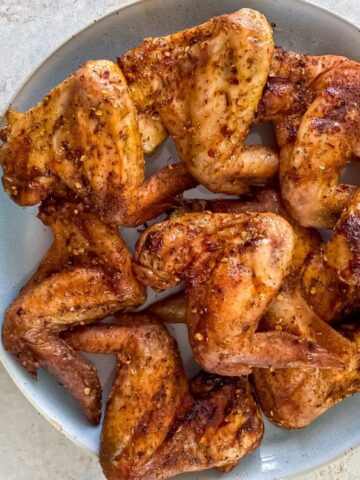 smoked chicken wings on a plate